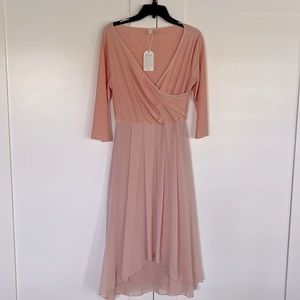 Flowy event dress. Lined with chiffon over skirt.